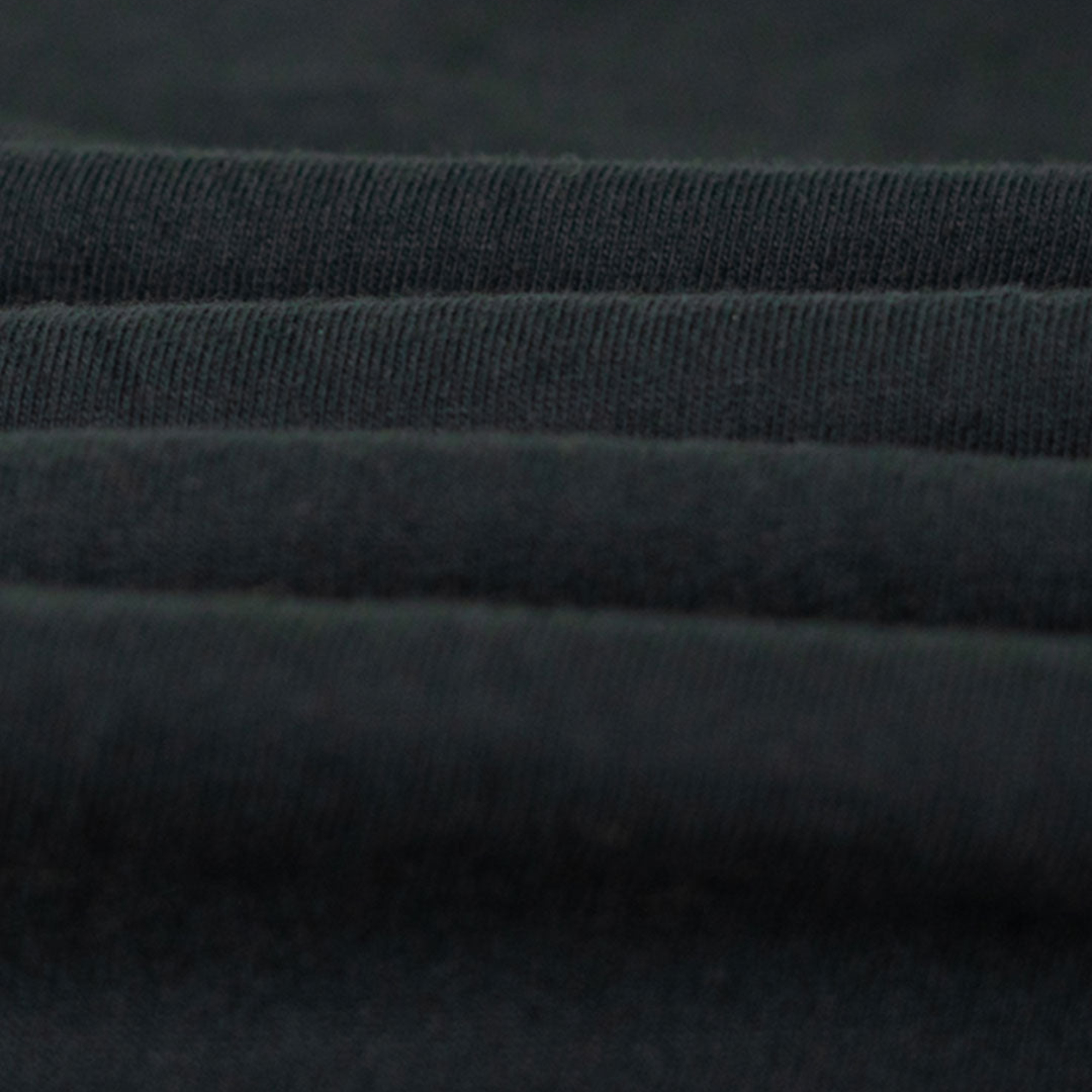 The black Car Rich Cash Poor Tee from Not Famous Racing Apparel highlighting the fabric quality.