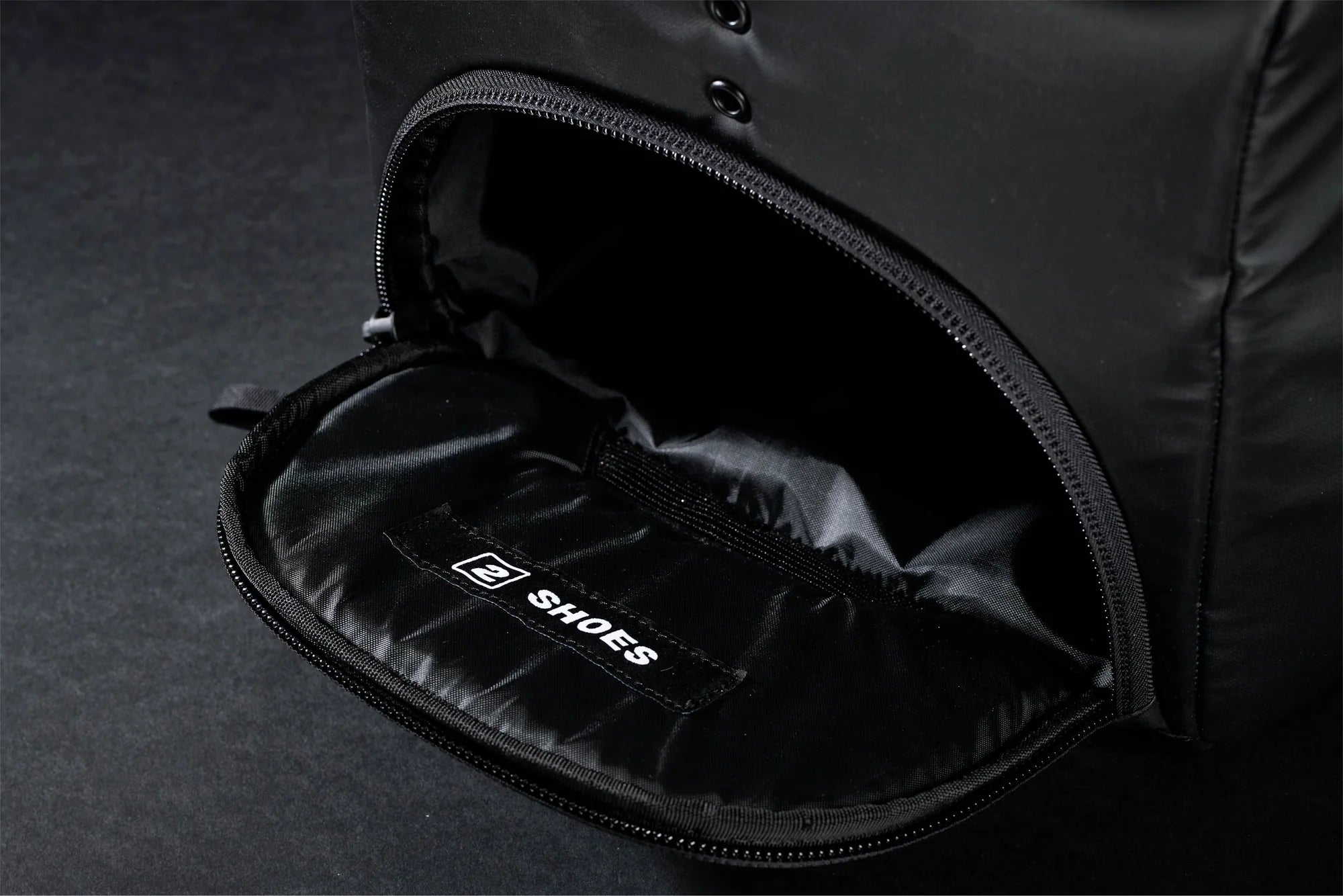 The LVRY CRRY Gear Bag from LVRY showing the shoe storage compartment.