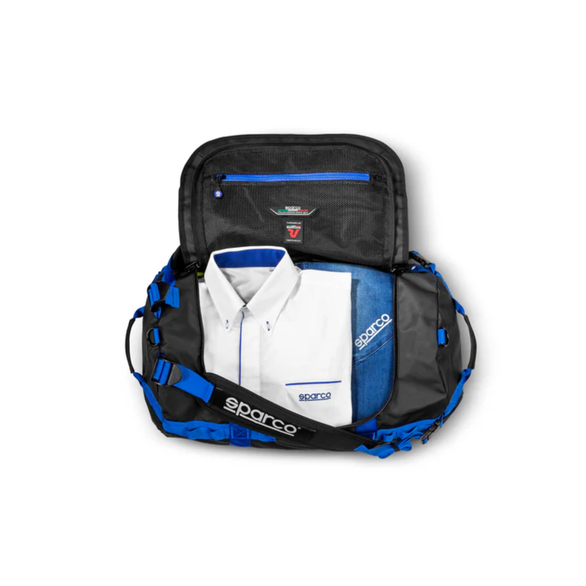 The black and blue Sparco Dakar Small Duffel Bag from Sparco open showing the internal storage.