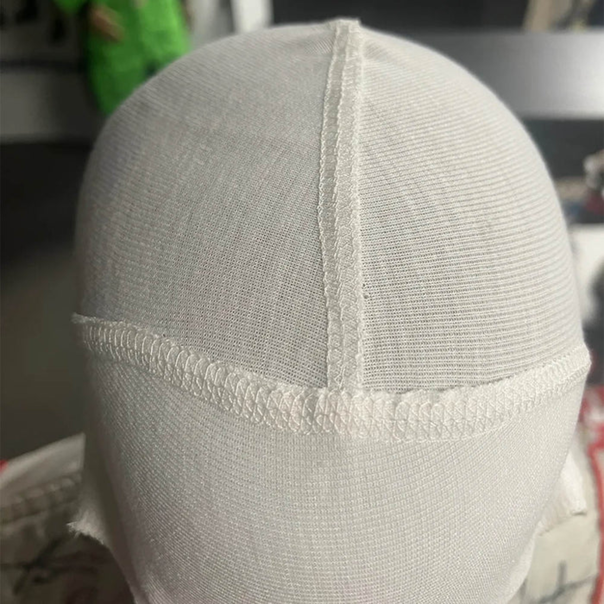 The Stand-21 Porsche Motorsports Balaclava from Stand 21 worn from the back.