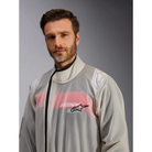 The Alpinestars Kart Rain Suit on a model close up.