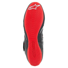The red and black Alpinestars Tech 1-KX v3 Karting Shoes showing the bottom or the sole of the shoe.