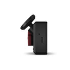 The Garmin Catalyst 2 Driving Performance Optimizer from the left side showing the charging port.