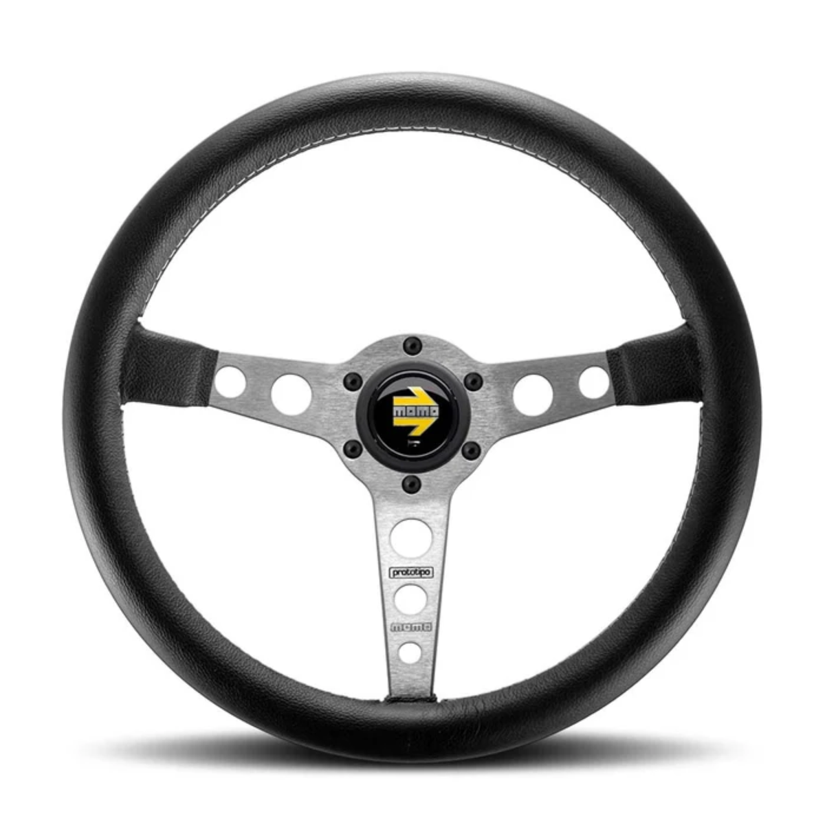 The silver Momo Prototipo Steering Wheel.