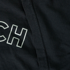 The black Car Rich Cash Poor Tee from Not Famous Racing Apparel showing the threading quality of the shirt.