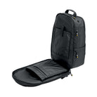 The black OMP Backpack, open, showing the internal storage.