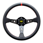 The black leather OMP Corsica Steering Wheel with red stitching.