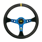 The black suede OMP Corsica Steering Wheel with blue spokes.