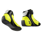 The heel and sole of the yellow OMP One Evo X Racing Shoes.