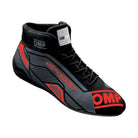 A single black and red OMP Sport Racing Shoe.