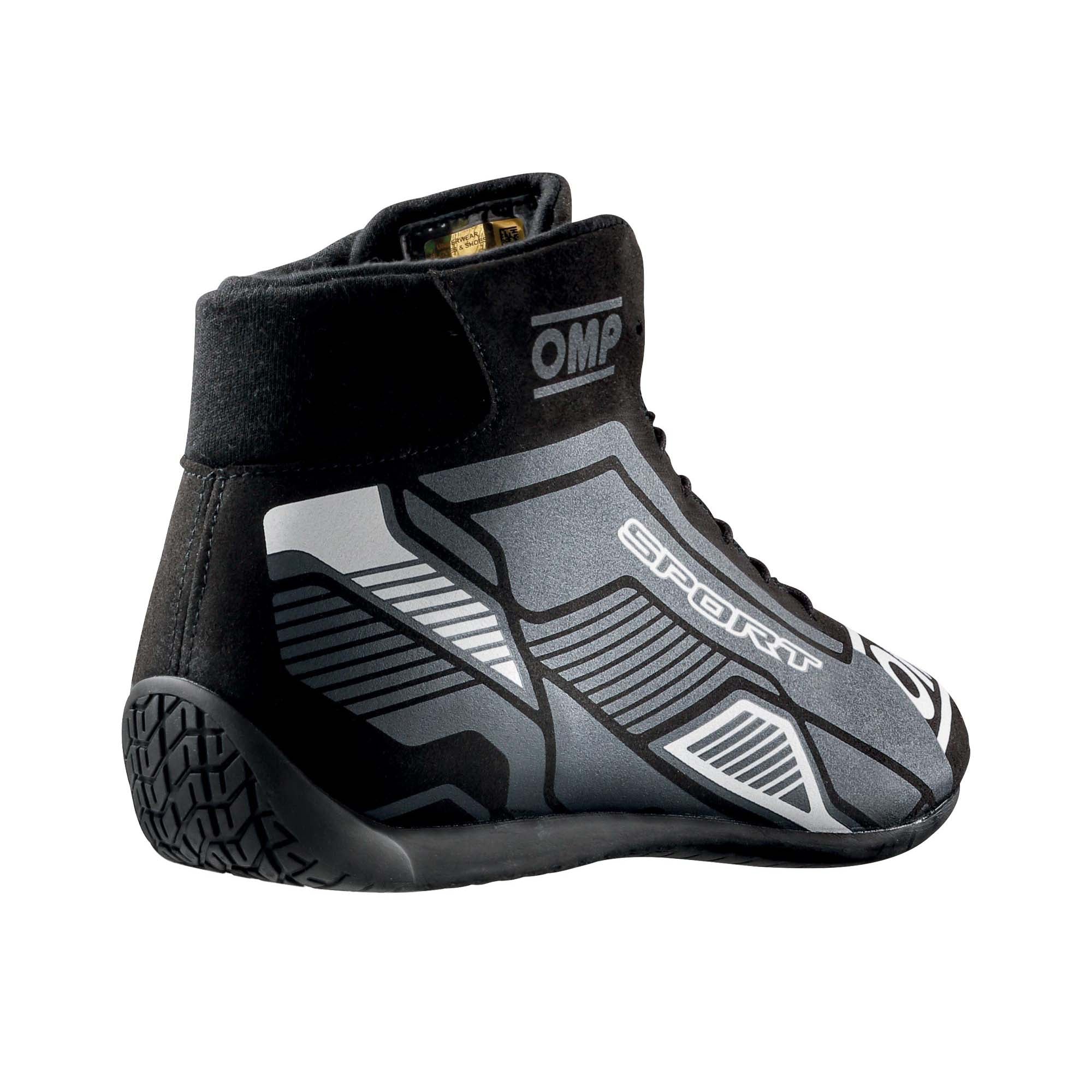 The black and white OMP Sport Racing Shoes from the back, showing the heel.