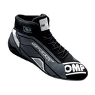 A single black and white OMP Sport Racing Shoe.