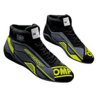 The black and yellow OMP Sport Racing Shoes.