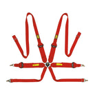 The red OMP Tecnica 3+2 Racing Harness.
