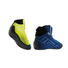 The blue and yellow OMP Tecnica Racing Shoes showing the heel and sole.
