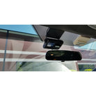 The Road-Keeper Dual HD Video Camera is mounted on a windshield window.