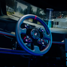 The Simagic Neo X 330R Classic Steering Wheel used with a sim rig for sim racing.