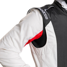 The black and white SFI 3.2a/5 rated Sparco Competition US Racing Suit up close showing the shoulder.