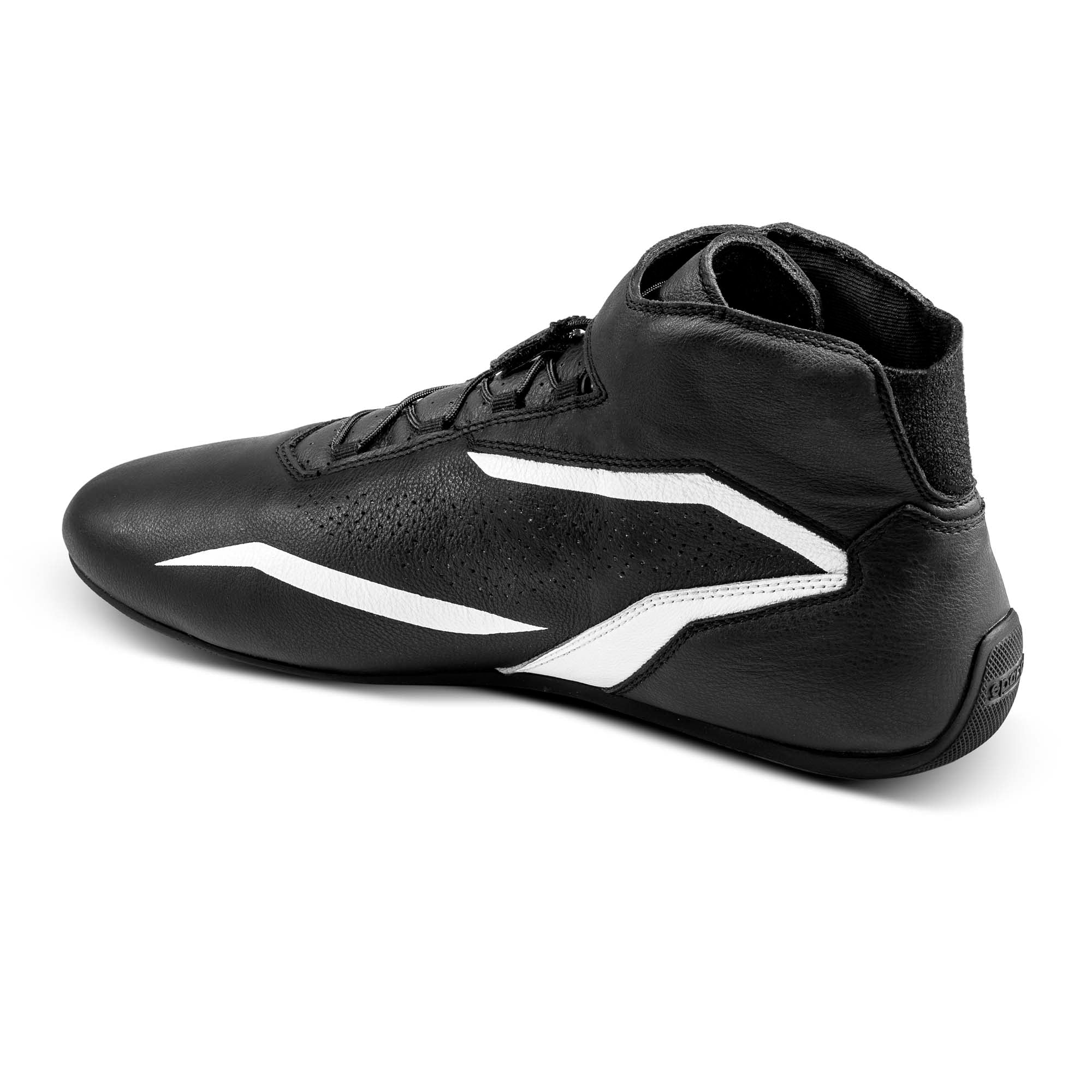 The inside of the black and white Sparco Formula Racing Shoes at an angle.