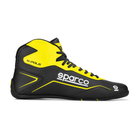 The black and yellow Sparco K-Pole Karting Shoe from Sparco from the side.
