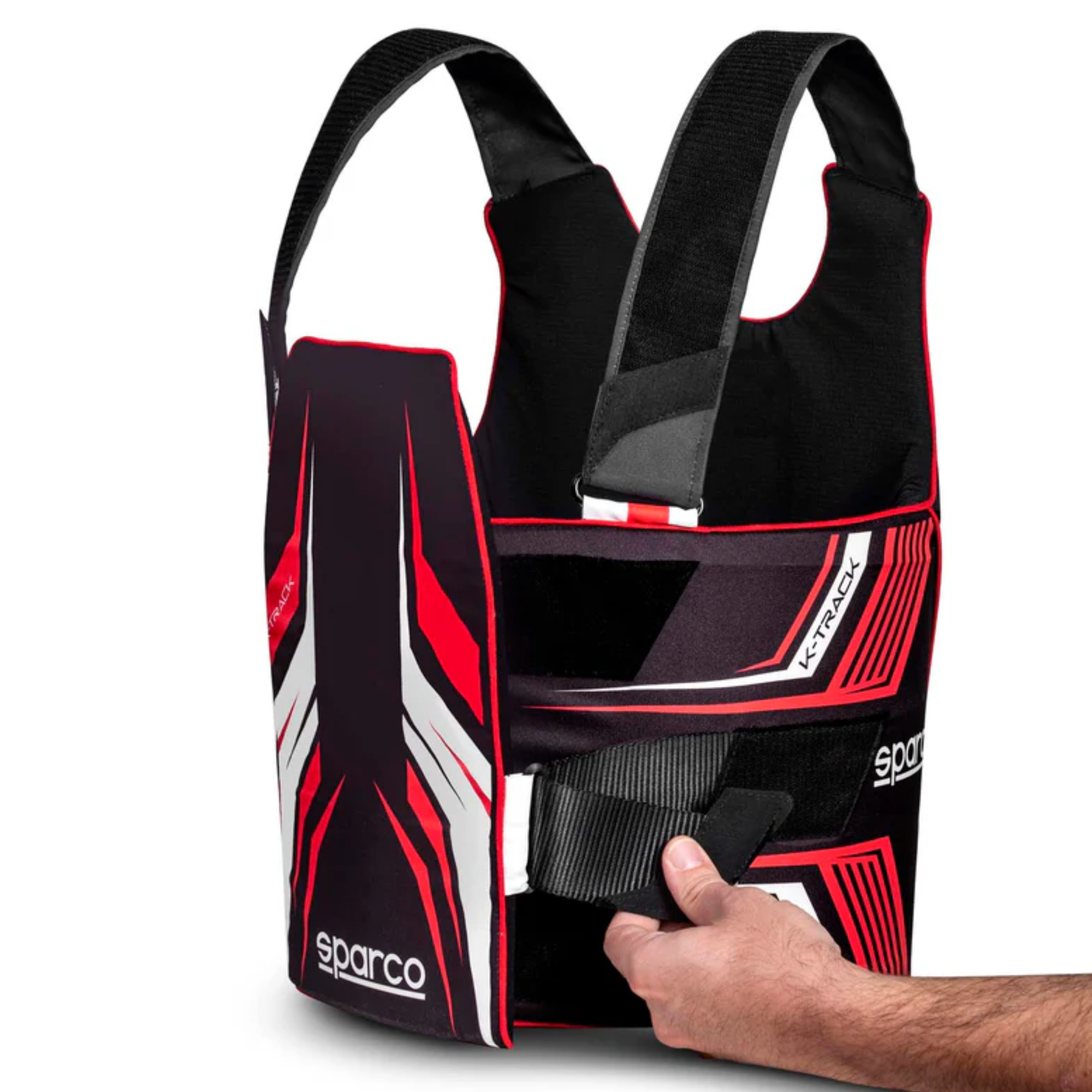 The black and red Sparco K-Track Rib Protector Vest from Sparco in a studio lifestyle photo showing the adjustable straps.