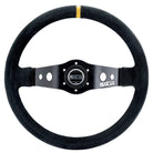 The Sparco R-215 Steering Wheel, a Sparco racing wheel featuring a black suede rim, a black metal center hub, and a thin yellow stripe at the top.