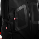 The black Sparco Stage Backpack from Sparco with red accents close up.
